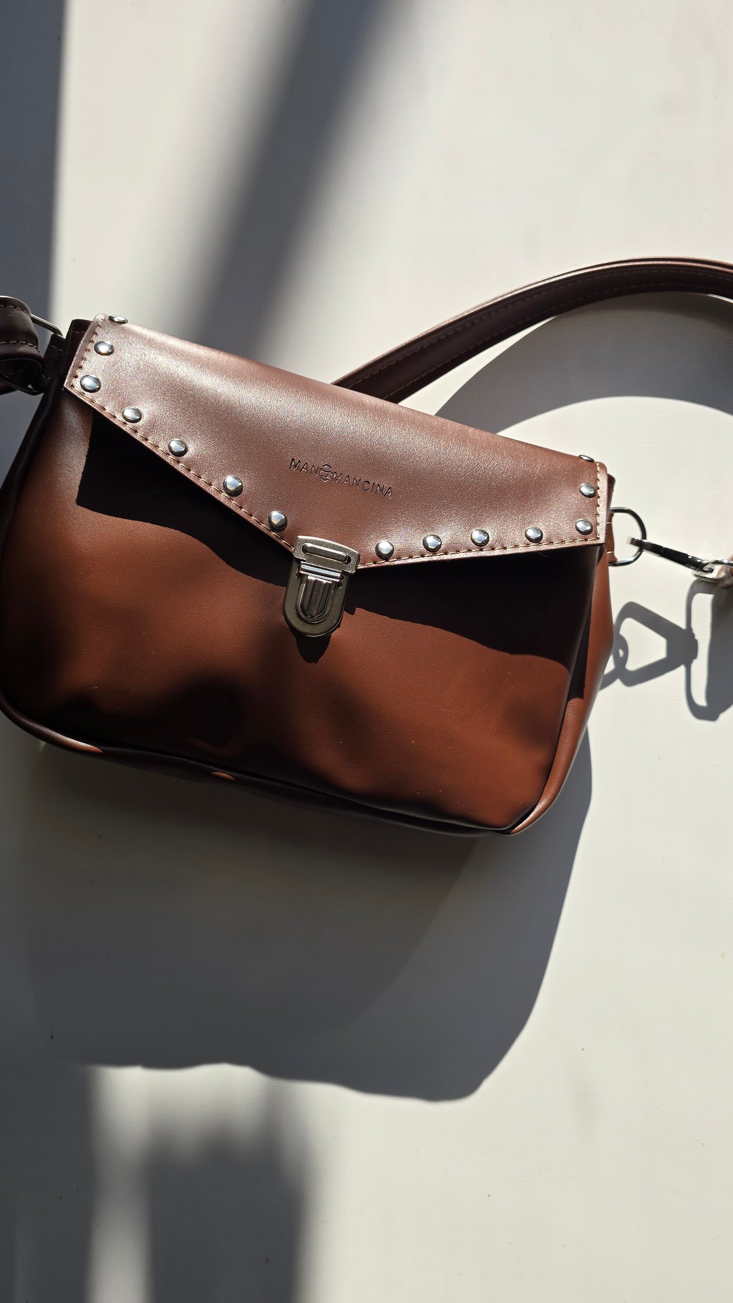 MARSUPIELLO large chocolate/borchie