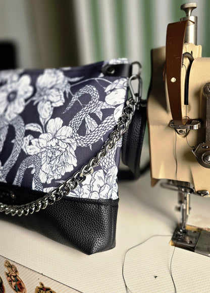 GILDA similpelle nero/fiori serpenti