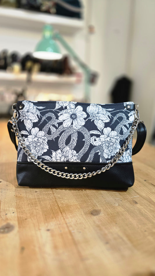 GILDA similpelle nero/fiori serpenti